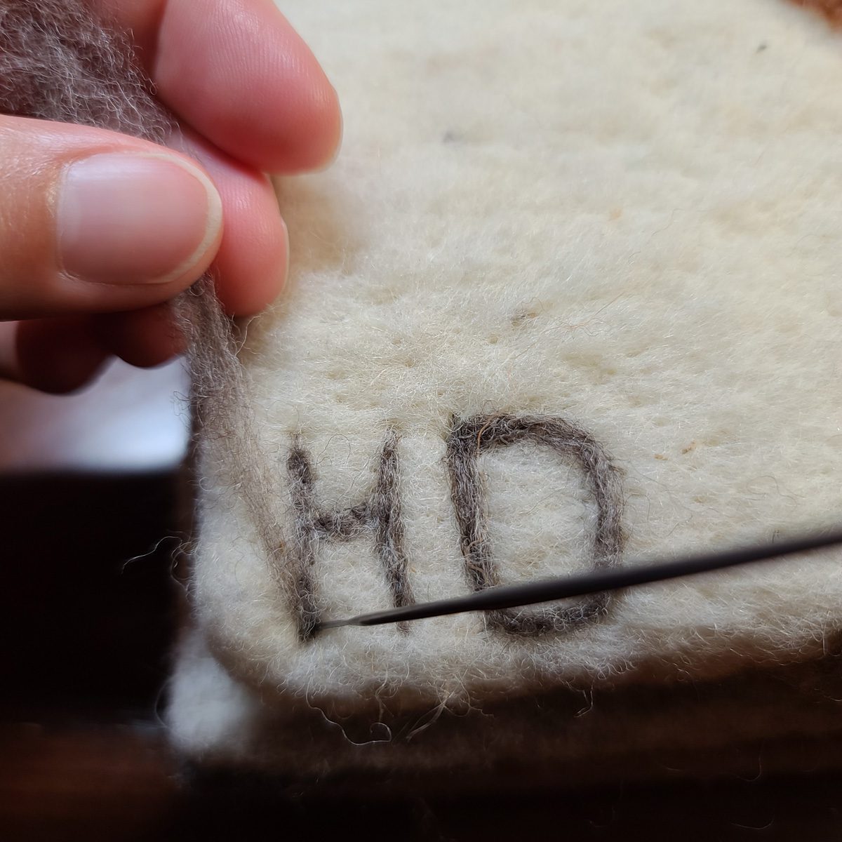 felted signature Hillary Dow