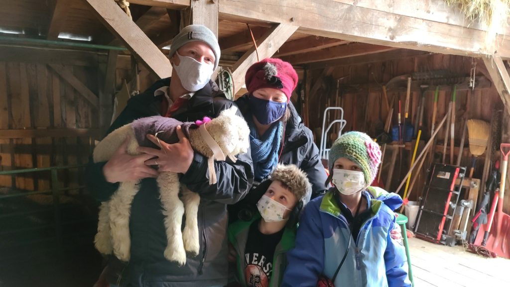 The Dow family Adopt a Lamb 2021 at a Wrinkle in Thyme Farm, Sumner, Maine