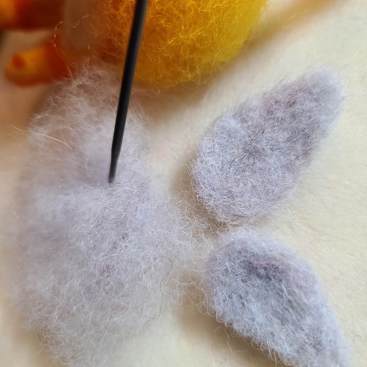 Needle Felting a Sun Fairy doll, forming the wings
