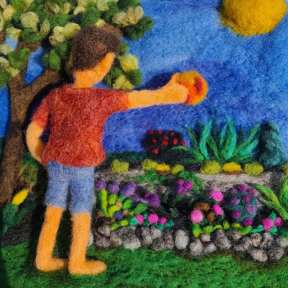 Needle Felting a sunny yard with a flower bed with a young child standing 