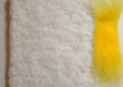 Begin with a base layer of core wool and place the sun.