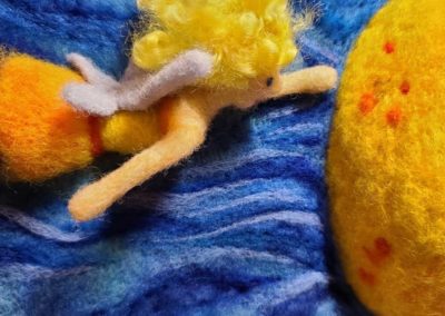 I prefer to leave some loosely felted fibers next to more firm, more tightly felted fibers for the contrast.