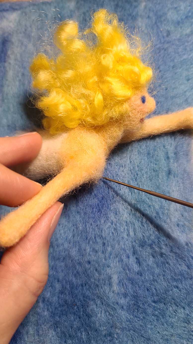 Sun Fairy Flies Into the Sun Sun Fairy Flies Into the Sun, needle felting lesson to learn techniques to create motion lines with wool.