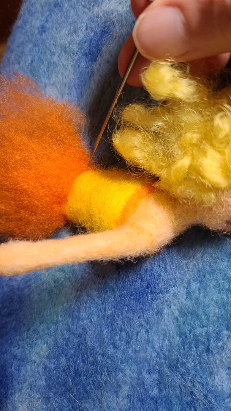 Sun Fairy Flies Into the Sun Sun Fairy Flies Into the Sun, needle felting lesson to learn techniques to create a figure with wings and motion lines - all with wool!