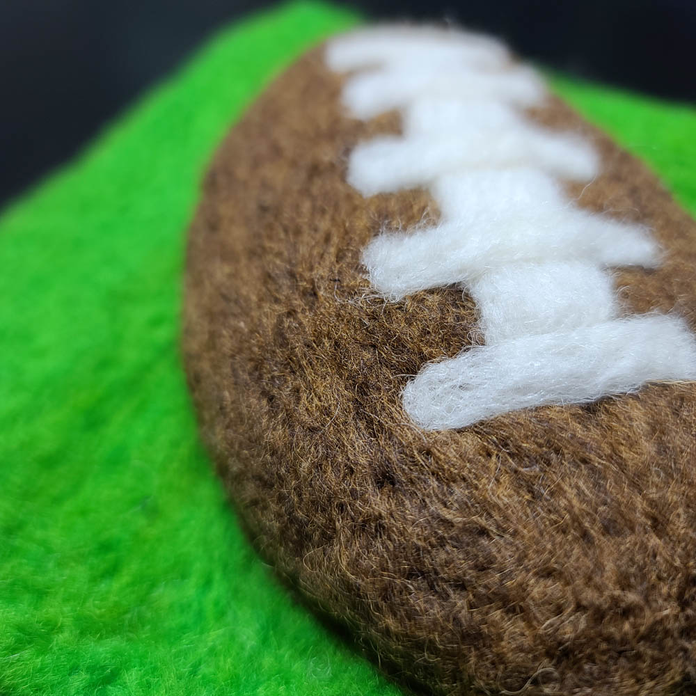 Alphabet Book football illustration fiber detail Alphabet Book football illustration fiber detail of needle felting artist Hillary Dow