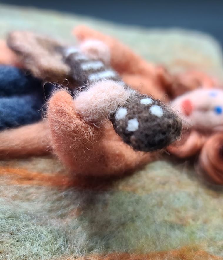 Neck of Guitar needle felted